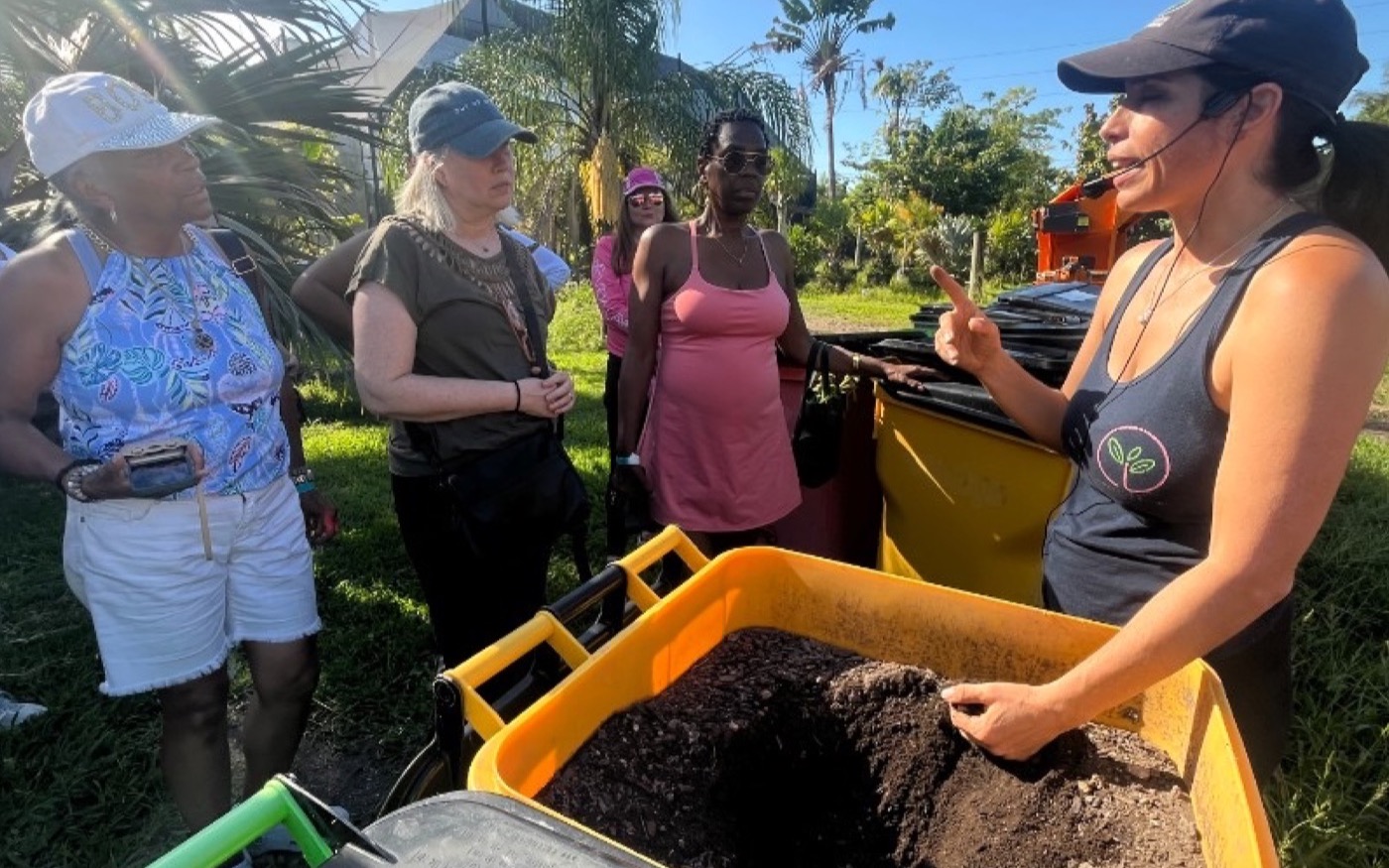 Compost and soil demonstration during a farm tour.