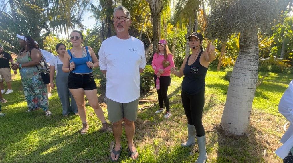 Farm tour guide speaking to guests in the Redland Agricultural District